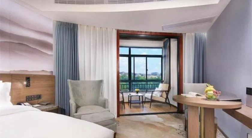 Bed in Vienna Hotel Guangxi Guilin 7-Star Wanda Plaza