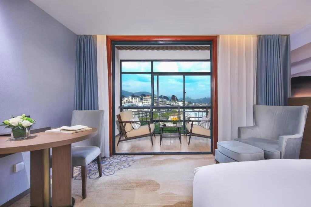 Bed in Vienna Hotel Guangxi Guilin 7-Star Wanda Plaza