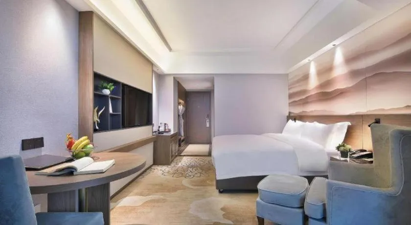 Bed in Vienna Hotel Guangxi Guilin 7-Star Wanda Plaza