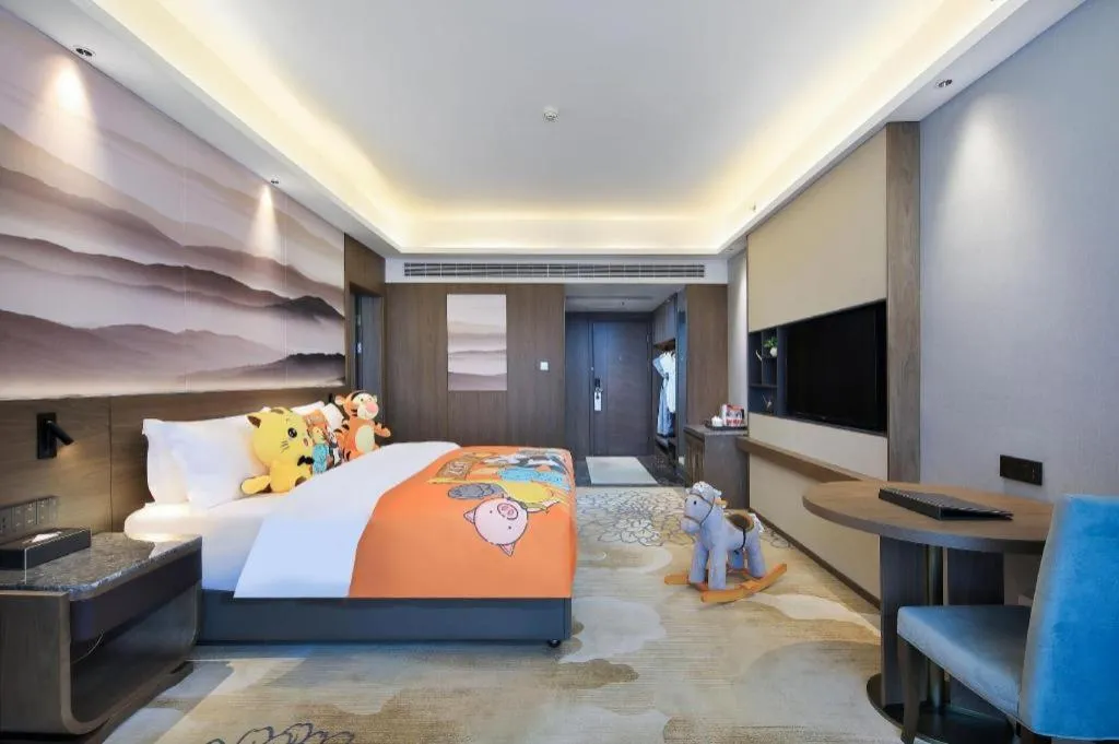 Bed in Vienna Hotel Guangxi Guilin 7-Star Wanda Plaza