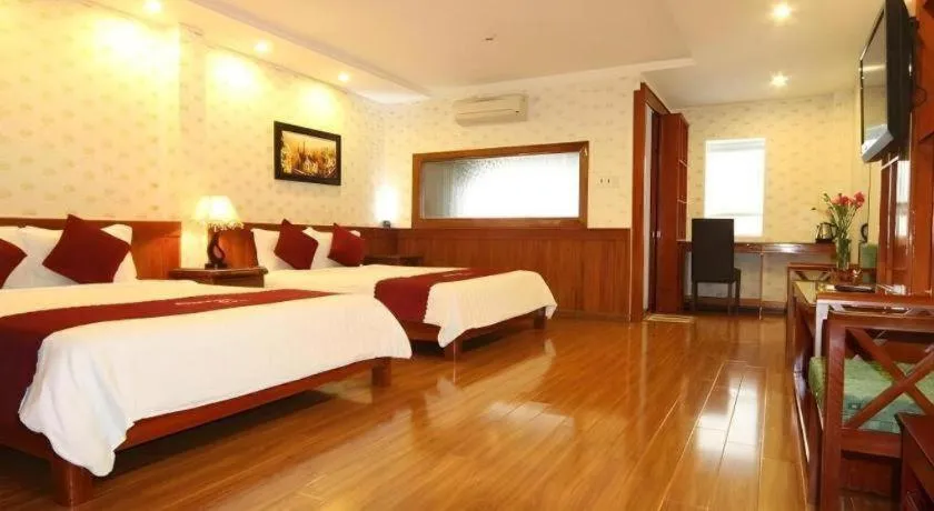 Bed in Omega Da Nang Beach Hotel
