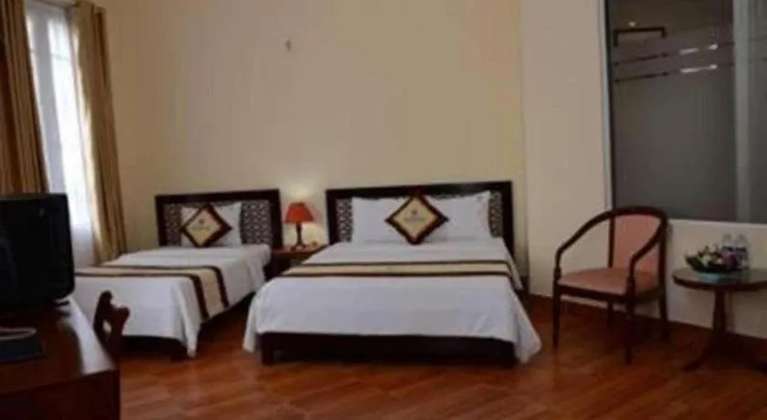 Bed in Omega Da Nang Beach Hotel