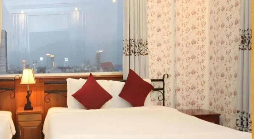 Bed in Omega Da Nang Beach Hotel