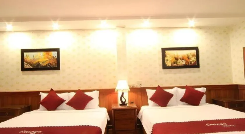 Bed in Omega Da Nang Beach Hotel