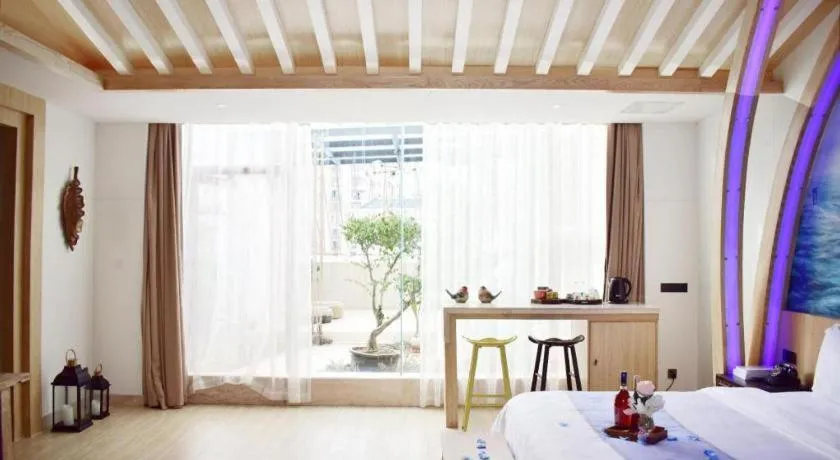 Bed in Huangma Holiday Nanhai Museum Hotel