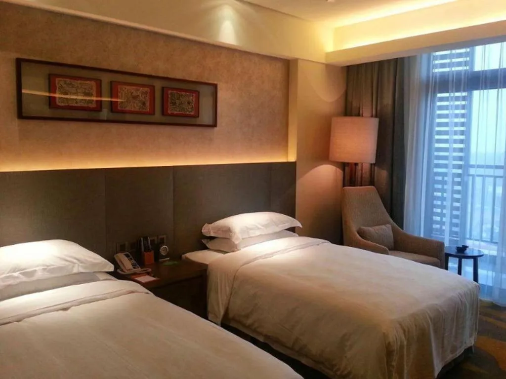 Bed in Wuhan Gleetour Hotel