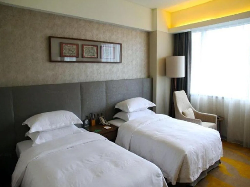 Bed in Wuhan Gleetour Hotel
