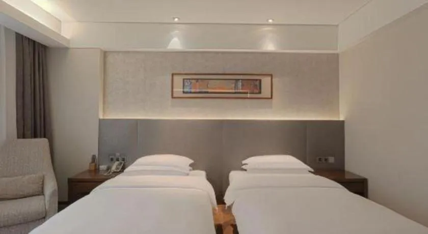 Bed in Wuhan Gleetour Hotel