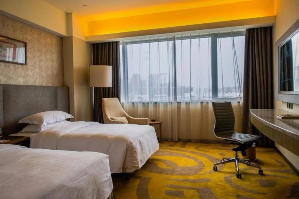 Bed in Wuhan Gleetour Hotel