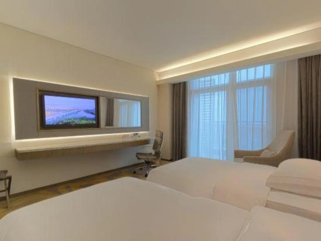 Bed in Wuhan Gleetour Hotel