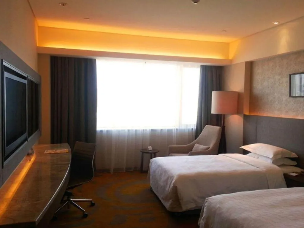 Bed in Wuhan Gleetour Hotel