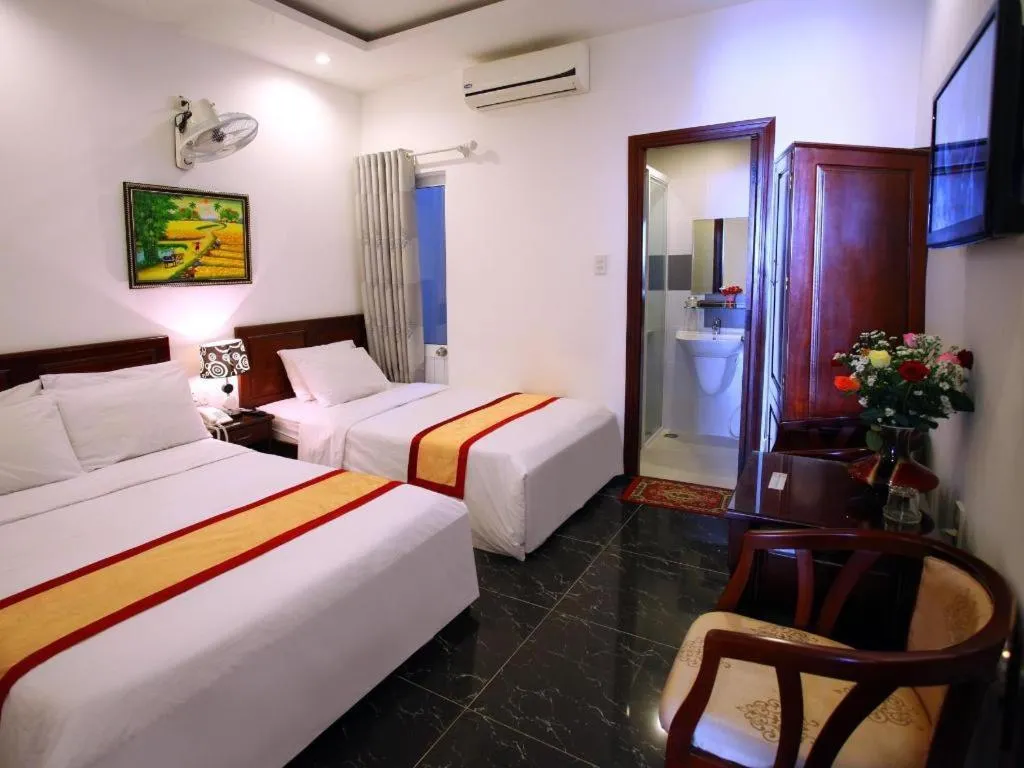 Bed in Souvenir Nha Trang Hotel