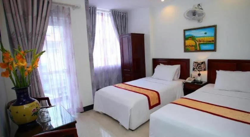 Bed in Souvenir Nha Trang Hotel