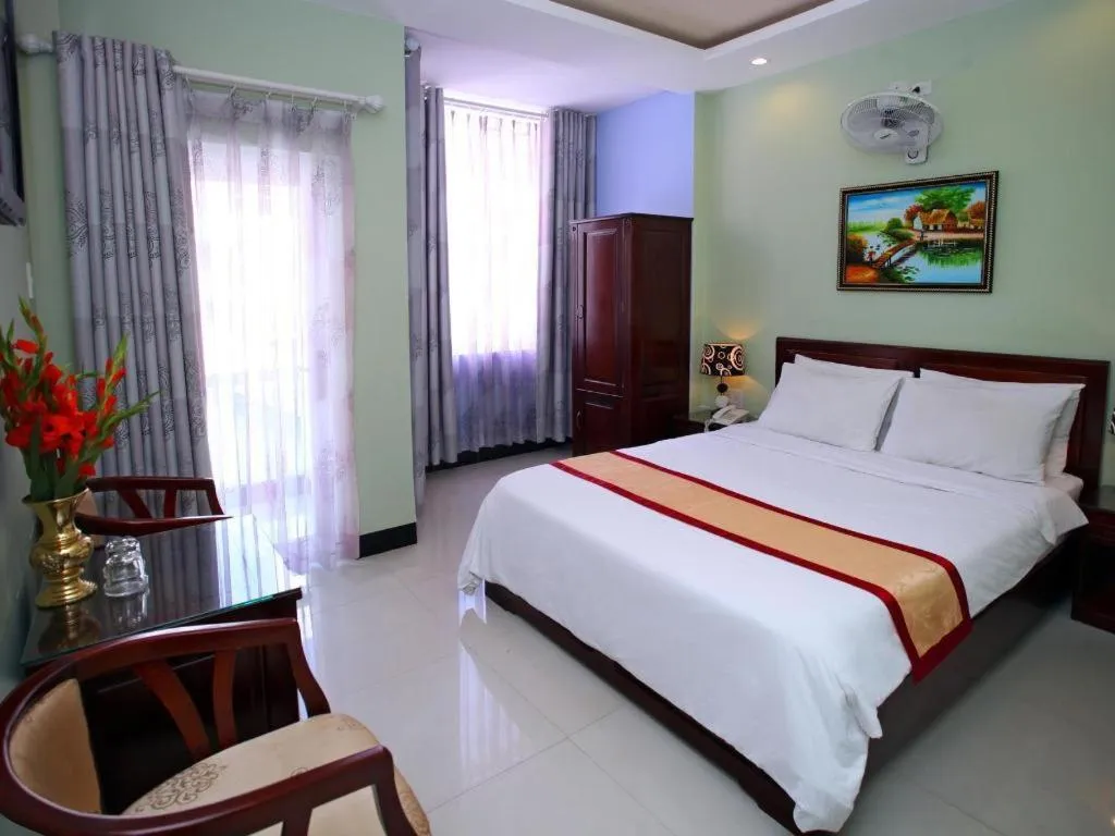 Bed in Souvenir Nha Trang Hotel