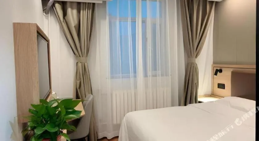 Bed in GreenTree Inn Beijing Fengtai Dongda Street Express Hotel