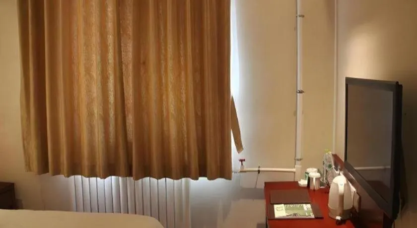 Bed in GreenTree Inn Beijing Fengtai Dongda Street Express Hotel