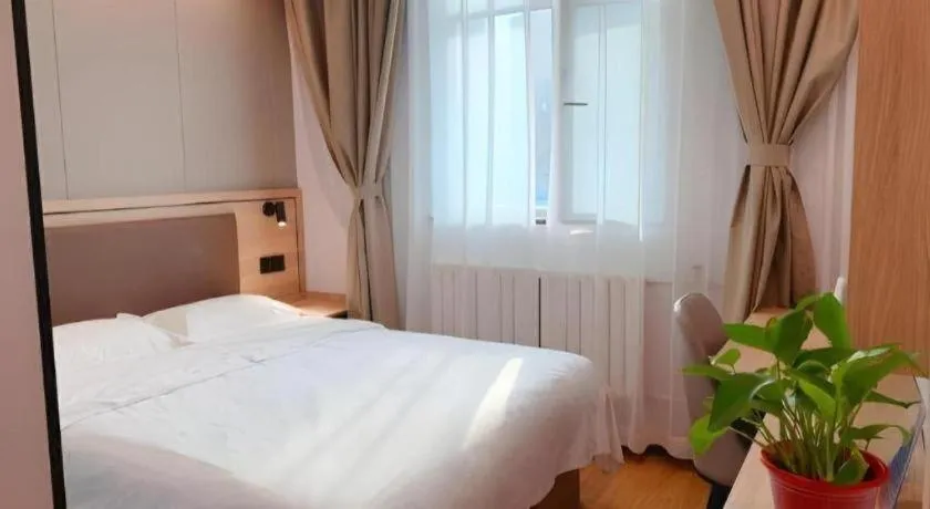 Bed in GreenTree Inn Beijing Fengtai Dongda Street Express Hotel