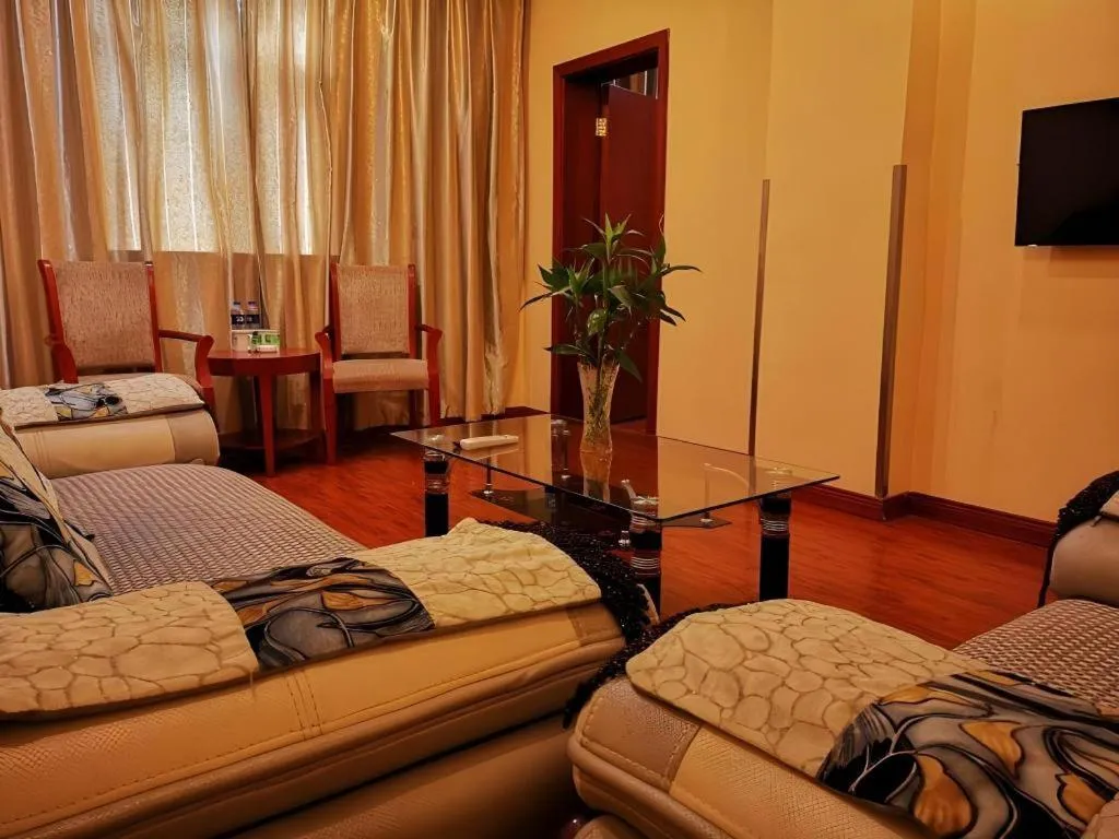 Bed in GreenTree Inn Yixing Zhangzhu Express Hotel