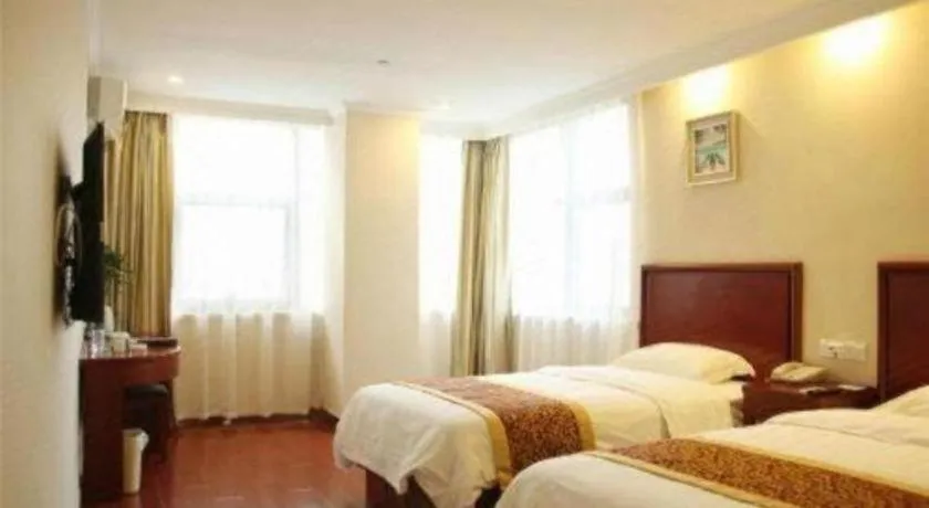 Bed in GreenTree Inn Yixing Zhangzhu Express Hotel