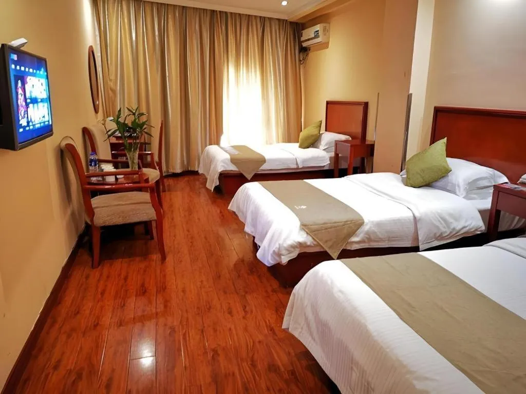 Bed in GreenTree Inn Yixing Zhangzhu Express Hotel