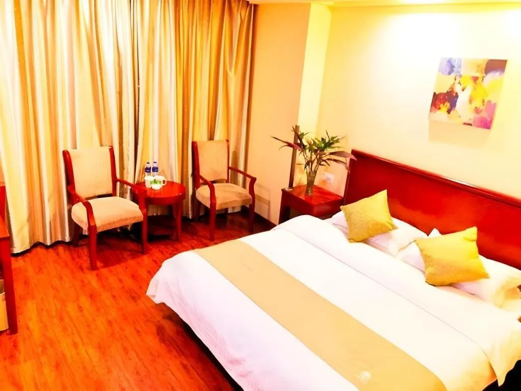 Bed in GreenTree Inn Yixing Zhangzhu Express Hotel