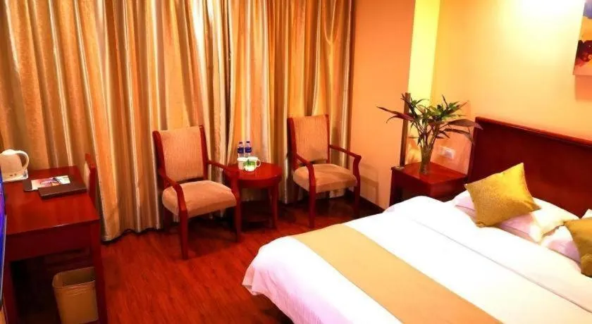 Bed in GreenTree Inn Yixing Zhangzhu Express Hotel