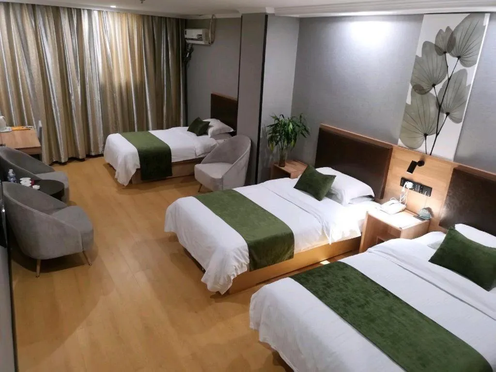Bed in GreenTree Inn Yixing Zhangzhu Express Hotel