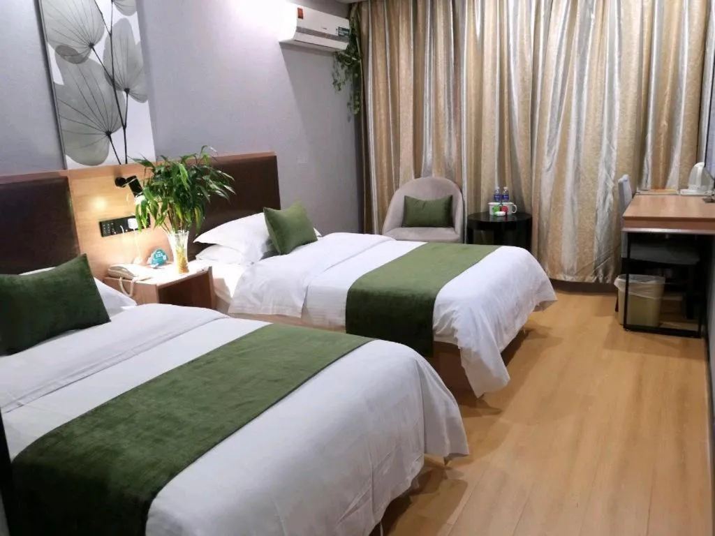 Bed in GreenTree Inn Yixing Zhangzhu Express Hotel