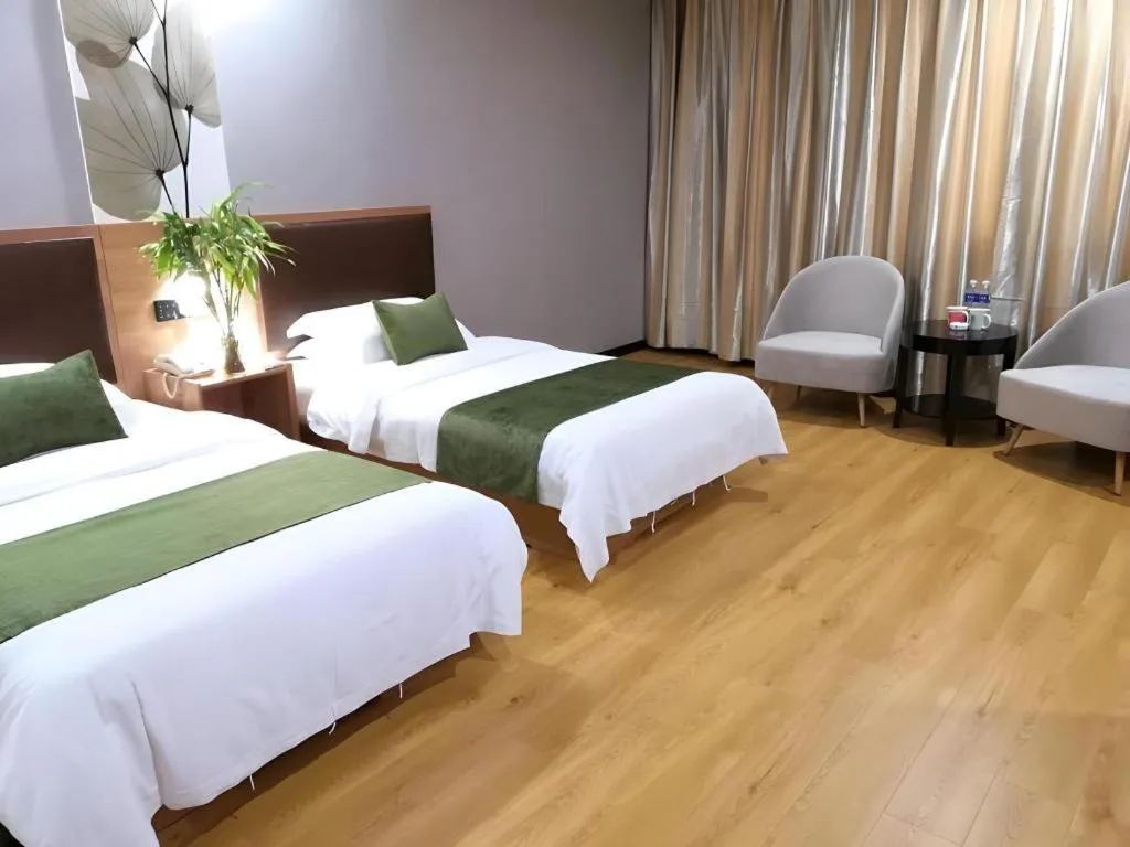 Bed in GreenTree Inn Yixing Zhangzhu Express Hotel
