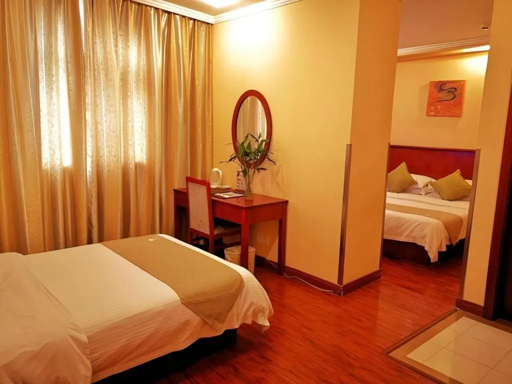 Bed in GreenTree Inn Yixing Zhangzhu Express Hotel
