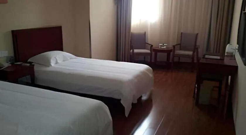 Bed in GreenTree Inn Yixing Zhangzhu Express Hotel