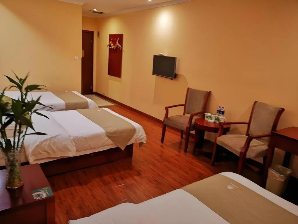 Bed in GreenTree Inn Yixing Zhangzhu Express Hotel