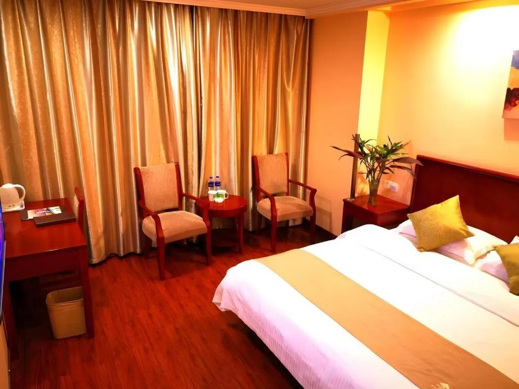 Bed in GreenTree Inn Yixing Zhangzhu Express Hotel