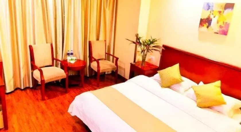 Bed in GreenTree Inn Yixing Zhangzhu Express Hotel