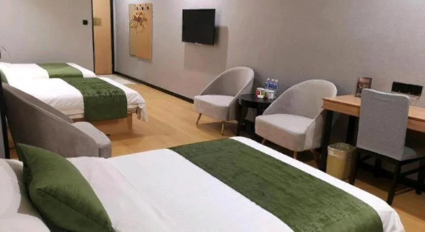 Bed in GreenTree Inn Yixing Zhangzhu Express Hotel