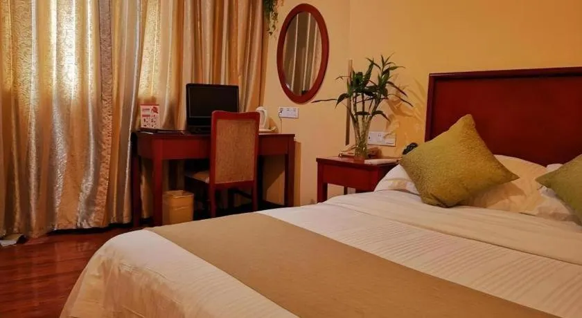 Bed in GreenTree Inn Yixing Zhangzhu Express Hotel