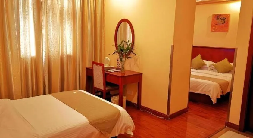 Bed in GreenTree Inn Yixing Zhangzhu Express Hotel