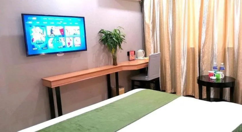 Bed in GreenTree Inn Yixing Zhangzhu Express Hotel