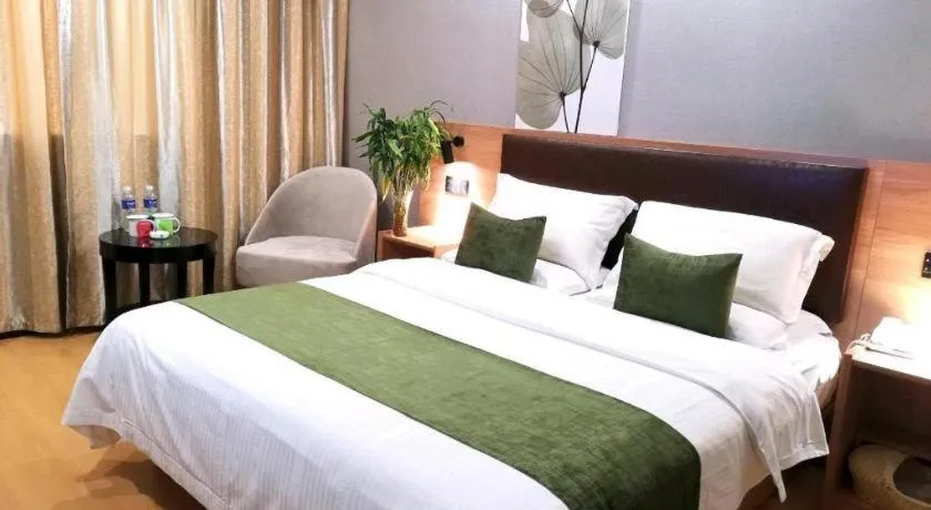 Bed in GreenTree Inn Yixing Zhangzhu Express Hotel
