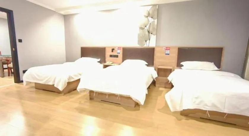 Bed in GreenTree Inn Yixing Zhangzhu Express Hotel