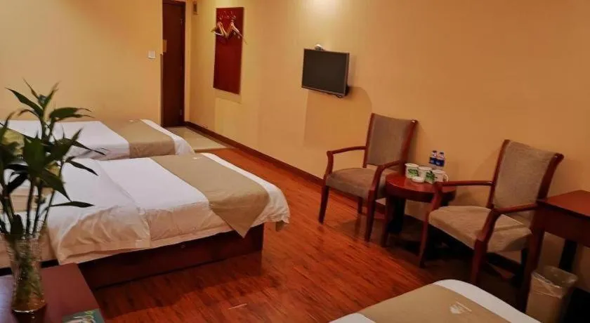 Bed in GreenTree Inn Yixing Zhangzhu Express Hotel