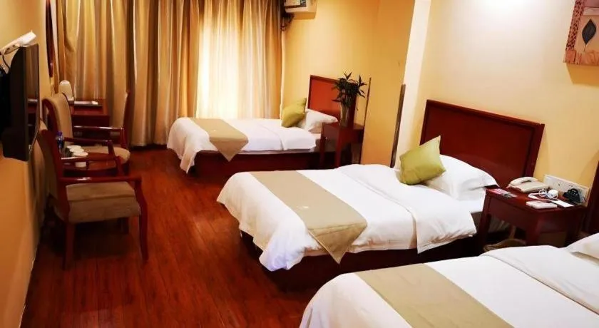 Bed in GreenTree Inn Yixing Zhangzhu Express Hotel