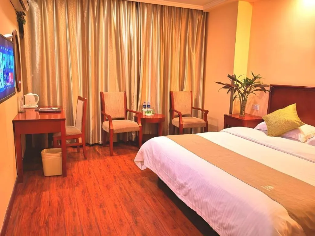 Bed in GreenTree Inn Yixing Zhangzhu Express Hotel
