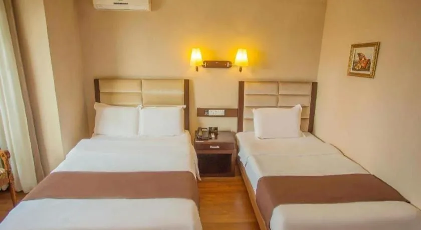 Bed in Anshan Camilla Business Hotel