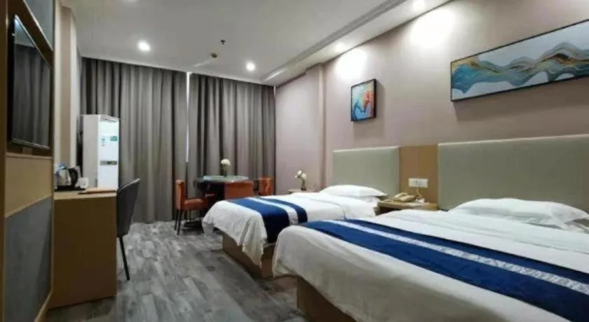 Bed in GreenTree Inn Nantong Haian Kaifa District Express Hotel