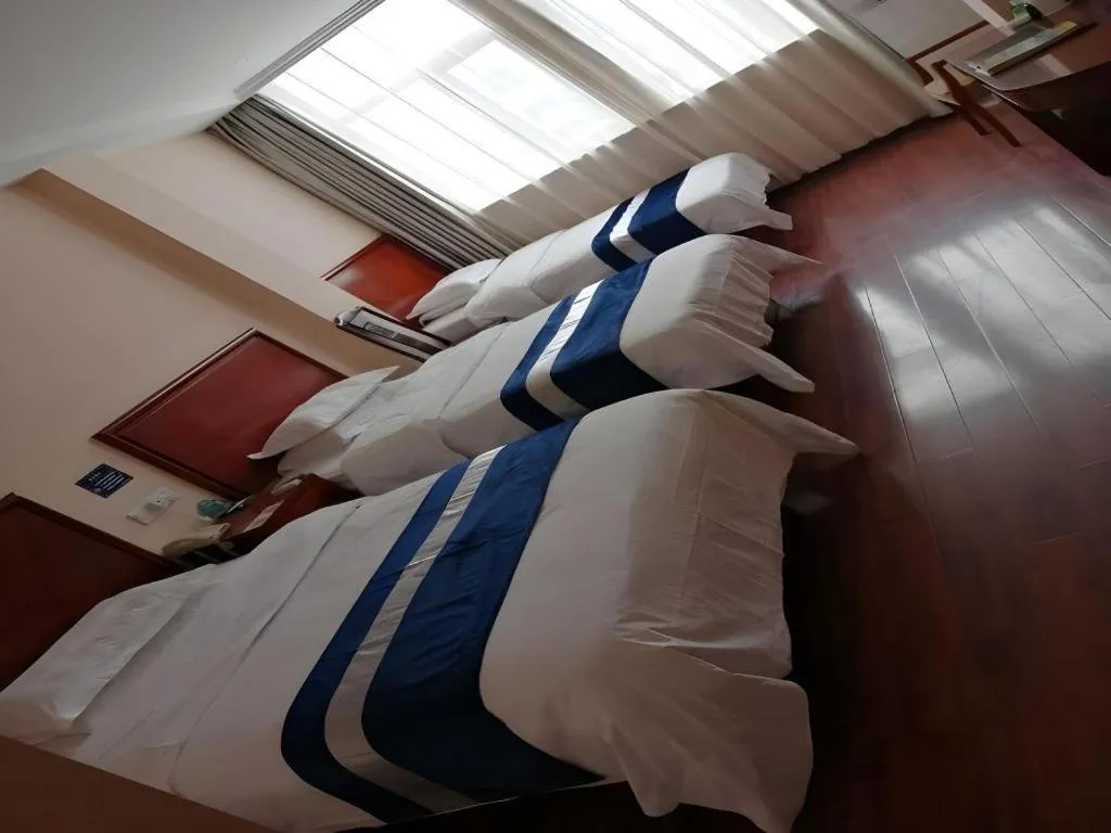 Bed in GreenTree Inn Nantong Haian Kaifa District Express Hotel