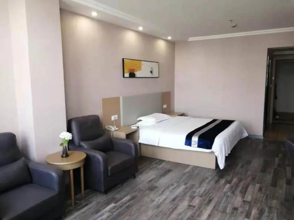 Bed in GreenTree Inn Nantong Haian Kaifa District Express Hotel