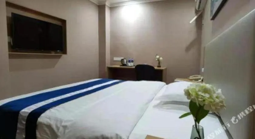 Bed in GreenTree Inn Nantong Haian Kaifa District Express Hotel