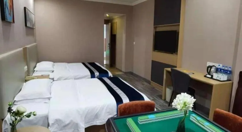 Bed in GreenTree Inn Nantong Haian Kaifa District Express Hotel
