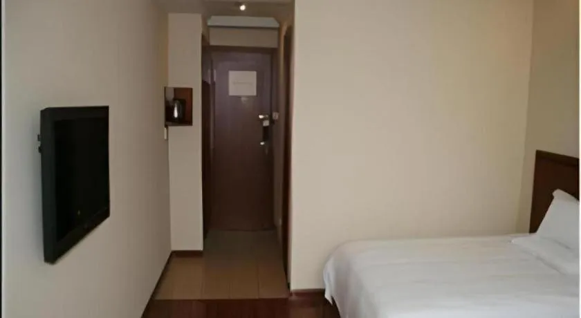 Bed in GreenTree Inn Nantong Haian Kaifa District Express Hotel